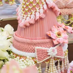An incredibly detailed, handcrafted floral structure used as decor for the wedding ceremony. This level of artistry and craftsmanship is a hallmark of our design philosophy.