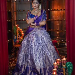 A full-length portrait from the Diwali shoot, showing the stunning purple and silver brocade lehenga.
