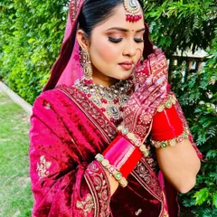 Another angle showing the delicate details of the bridal henna. Notice the fine lines and traditional motifs that extend up the fingers, creating a complete and elegant look.