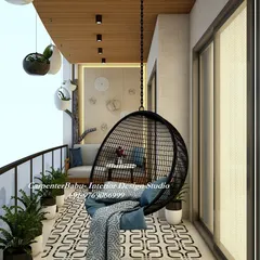 A closer look at the wicker swing chair, a key feature for creating a relaxing atmosphere. I ensure every element, from the comfortable cushions to the wooden ceiling with recessed lights, works together to build your perfect comfort zone.