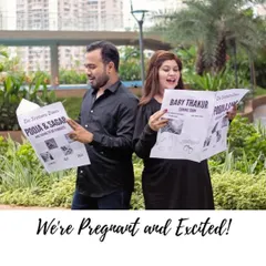 "We're Pregnant and Excited!" The couple's reaction while reading their own special newspaper announcement is priceless. It’s a playful and creative concept.