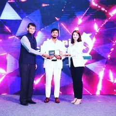 Receiving the Iconic Achievers Award 2022 from actress Pooja Gor and former cricketer Sandeep Patil. This award celebrates my firm's dedication to providing top-tier tax and accounting services.