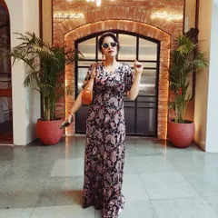 This flowing paisley print maxi dress is the definition of effortless elegance. It's a one-and-done outfit that looks polished for a day out.