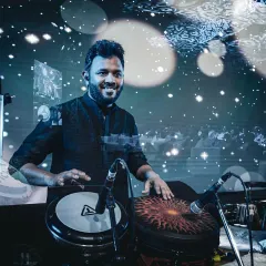 A beautifully captured moment from a live ghazal concert. The artistic lighting and my focus on the Djembe reflect the sophisticated atmosphere of the evening.