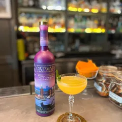 This bright yellow mocktail, made with Catwalk Botanics, is a tropical escape in a glass. It proves that you don't need spirits to have a spirited drink.