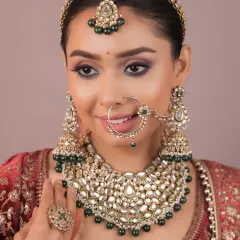 This look showcases the art of creating a complete, cohesive bridal appearance. You will learn how to select makeup tones that complement the outfit, jewelry, and accessories like the nath (nose ring).