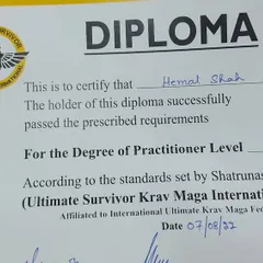 My diploma for Practitioner Level F-5 in the Shatrunashak System of Krav Maga. Continuous learning is essential.
