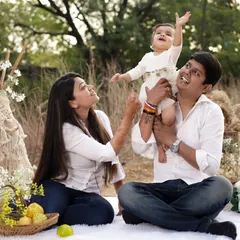 Sometimes the most beautiful moments are the simple ones. We did this outdoor pre-birthday session with a relaxed picnic theme. Capturing the pure love and happiness between parents and their beti is what makes our job so special.