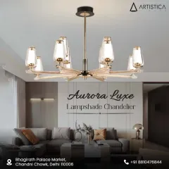 The Aurora Luxe chandelier blends classic form with modern sensibility. Its elegant glass lampshades diffuse light softly, creating a warm and inviting atmosphere ideal for sophisticated dining rooms and living spaces.