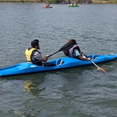 Kayaking on the calm waters of Yagachi Dam. It's a peaceful yet engaging way to explore the surroundings and enjoy the water.