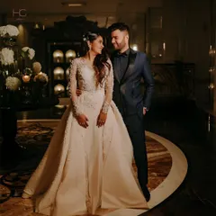 I created this custom-tailored navy tuxedo for my client Anirudh Garg's memorable night. The deep blue offers a sophisticated alternative to black, while the fit ensures pure elegance.