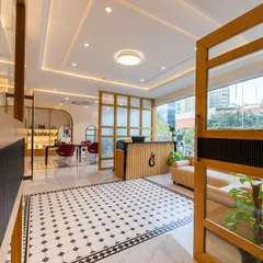 A glimpse into our Yelahanka, Bangalore clinic. The bright and airy design, complete with classic checkered flooring and modern touches, creates a welcoming atmosphere from the moment you walk in.