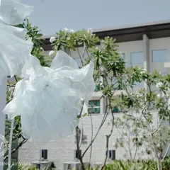 We created a dreamy photo-op for a poolside brunch with these life-sized, cloud-like florals. The whimsical structures against the clear sky provided a perfect, ethereal backdrop for pictures.