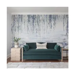 Create a tranquil and soothing atmosphere with this scenic wallpaper from the Serenity Collection by Phillip Jeffries. The depiction of weeping willow branches over a calm body of water brings a sense of peace and relaxation to this living space.