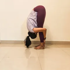Sometimes a forward bend feels like a warm hug to yourself. This is Uttanasana, a simple yet profound pose for releasing the hamstrings and lower back. It’s a staple in my classes for calming the nervous system.