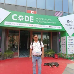 To bring the best strategies to my clients, I stay active in the industry. This is me at the entrance of CODE, India's Largest Digital Convention, where I connect with other experts and learn about the latest trends.