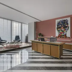 This 3,500 sq. ft. CEO office, located on the 35th floor in Mumbai, offers an incredible sea view and exudes both luxury and functionality. The striking diagonal stripes on the floor and the curated, private layout create a powerful environment for a leading petrochemical company.