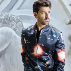 A celestial masterpiece. This satin bomber jacket features a vibrant, detailed graphic of the solar system. It is a unique piece of wearable art for the modern style enthusiast.