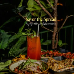 I believe every celebration deserves a feast. This spread, featuring some of our signature starters and a refreshing craft cocktail, is just a taste of the customizable menus I create for your events.