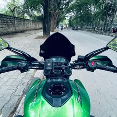 A slightly different angle of the cockpit view, capturing the feeling of being in control and ready to ride through the city.