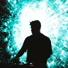 It's not just about playing music; it's about creating a world. I use silhouettes and powerful, abstract visuals to build a mood, turning the DJ booth into the center of an artistic experience.