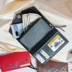 My personalized ladies' clutch is designed for both style and function. As you can see, it's spacious enough to hold your phone, cash, and multiple cards, making it the perfect everyday accessory.