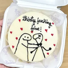 A bento cake with a sense of humor for a 30th birthday. These funny, hand-drawn designs are a great way to add a personal and playful touch to your celebration.