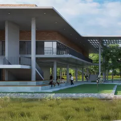 The ground level of the recreation centre, showing open, column-supported spaces that connect directly to the surrounding lawn and landscape. These areas foster interaction and provide shaded spaces for students to gather.