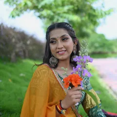 A candid moment from my Garba themed photoshoot. The colors, the accessories, and the setting all come together to celebrate the beauty of Gujarati culture.