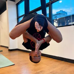 The pure joy of aerial yoga. This young yogi masters an inverted pose in the hammock, building incredible core strength and confidence while experiencing the fun of flying.