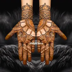 A symmetrical design with bold, modern paisleys and a clean, patterned wristband. The dark background makes the design pop.