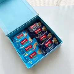 The inside of the baby announcement box, filled with an assortment of Loacker Minis. A simple, sweet, and delicious way to share the news.