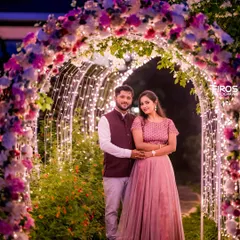 Nothing says magic like a tunnel of fairy lights. I love creating these enchanting evening settings that make you feel like you are the only two people in the world. This is a perfect example of a romantic couple portrait.