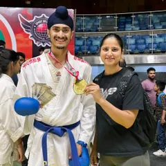 Celebrating a Gold Medal win at the India Open International Karate Championship with my mentor. This victory came with a cash prize, a testament to the rewards of dedication.