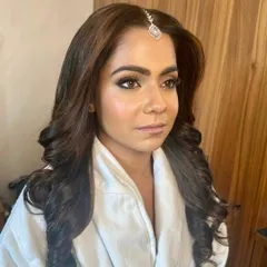 The concentration before the final reveal. Creating the perfect winged liner and soft smokey eye is a key part of my signature style.