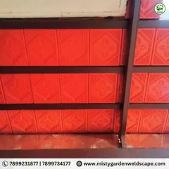 A close-up of the patterned Mangalore tiles used for a pergola ceiling. The intricate design adds a decorative element, while the tiles themselves provide excellent insulation from the heat.