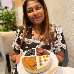 This is Julia, who got to be the first to taste our 4-in-1 baked cheesecake. We love sharing our new creations with our wonderful customers and hearing their thoughts.