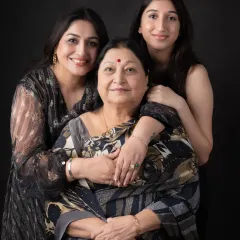 There is nothing more powerful than the bond between generations. We captured this beautiful portrait of a grandmother, mother, and daughter in our studio, creating a timeless memory for their family to cherish.