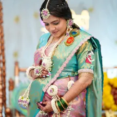 A tender moment celebrating her journey. The soft glam makeup ensures she feels comfortable and looks beautiful for this incredibly special and memorable day.