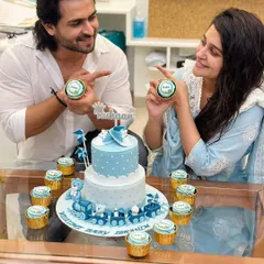 Welcoming baby Ruhaan! We had the pleasure of creating this blue and white two-tier cake and matching cupcakes for actors Dipika Kakar and Shoaib Ibrahim to celebrate their son's arrival. The design features a cute train and teddy bear details.