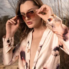 A fantastic close-up shot for a model's portfolio. It highlights her strong features and demonstrates her ability to connect with the camera, which is crucial for beauty and commercial work.