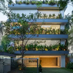 Where architecture breathes and nature ascends. This residential facade is a living sanctuary, with lush greenery cascading down terraces, integrating biophilic design into the heart of the urban landscape for a sustainable, healthy living experience.