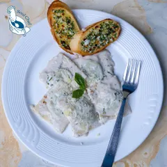 A taste of Italy with our Edamame and Truffle Stuffed Ravioli, served in a luxurious shiitake parmesan cream sauce.
