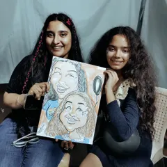Bringing friends together with art. This colorful group caricature was a big hit, capturing the fun personalities of these two guests. I can add color on the spot to make the portraits pop even more.