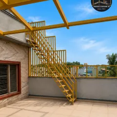 The project is taking shape. The vibrant yellow powder-coated steel frame and staircase are now installed, adding a bold design element to the rooftop space.
