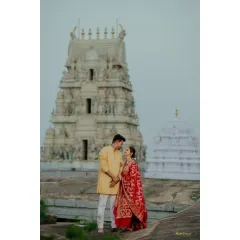 A beautiful pre-wedding shoot set against the backdrop of a traditional temple gopuram. I love blending cultural heritage with modern romance.