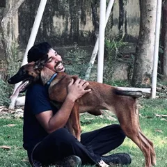 A hug from a happy Belgian Malinois. This is the purest form of love and companionship, and it's the reason I do what I do.