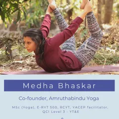 I am Medha Bhaskar, co-founder of Amrutha Bindu Yoga. With a Master's degree in Yoga, I interpret its philosophy in contemporary terms. I am passionate about helping students build a personal yogic framework for a productive, compassionate, and responsive life.