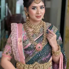 This is my signature bridal look, created during a demonstration for Pro Batch 20. Notice the balance between the bold lip, detailed eye makeup, and the intricate temple jewelry.