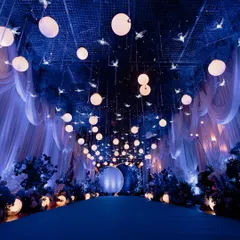 Welcome to the Celestial Sangeet. For this couple, we transformed a ballroom into a galaxy of stars, with a dreamy, starlit entrance that set the tone for a night of cosmic celebration.